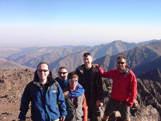 The group reach the summit at sunrise, Toubkal, Morocco At the summit Toubkal Morocco
