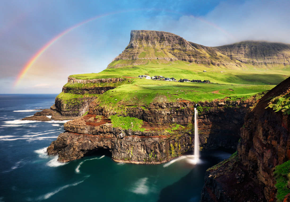 Faroe-island-landscape-waterfall-with-rainbow