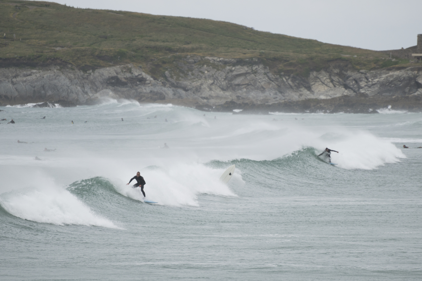 Types of Waves for Surfing Surfers on Fistral Beach, Newquay, Cornwall.