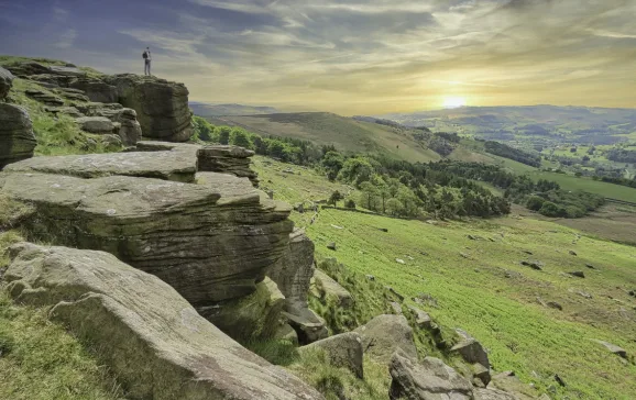 stanage edge hiker peak district