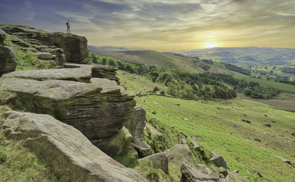 stanage edge hiker peak district